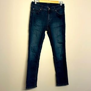 Cheap Monday fade blue jeans.